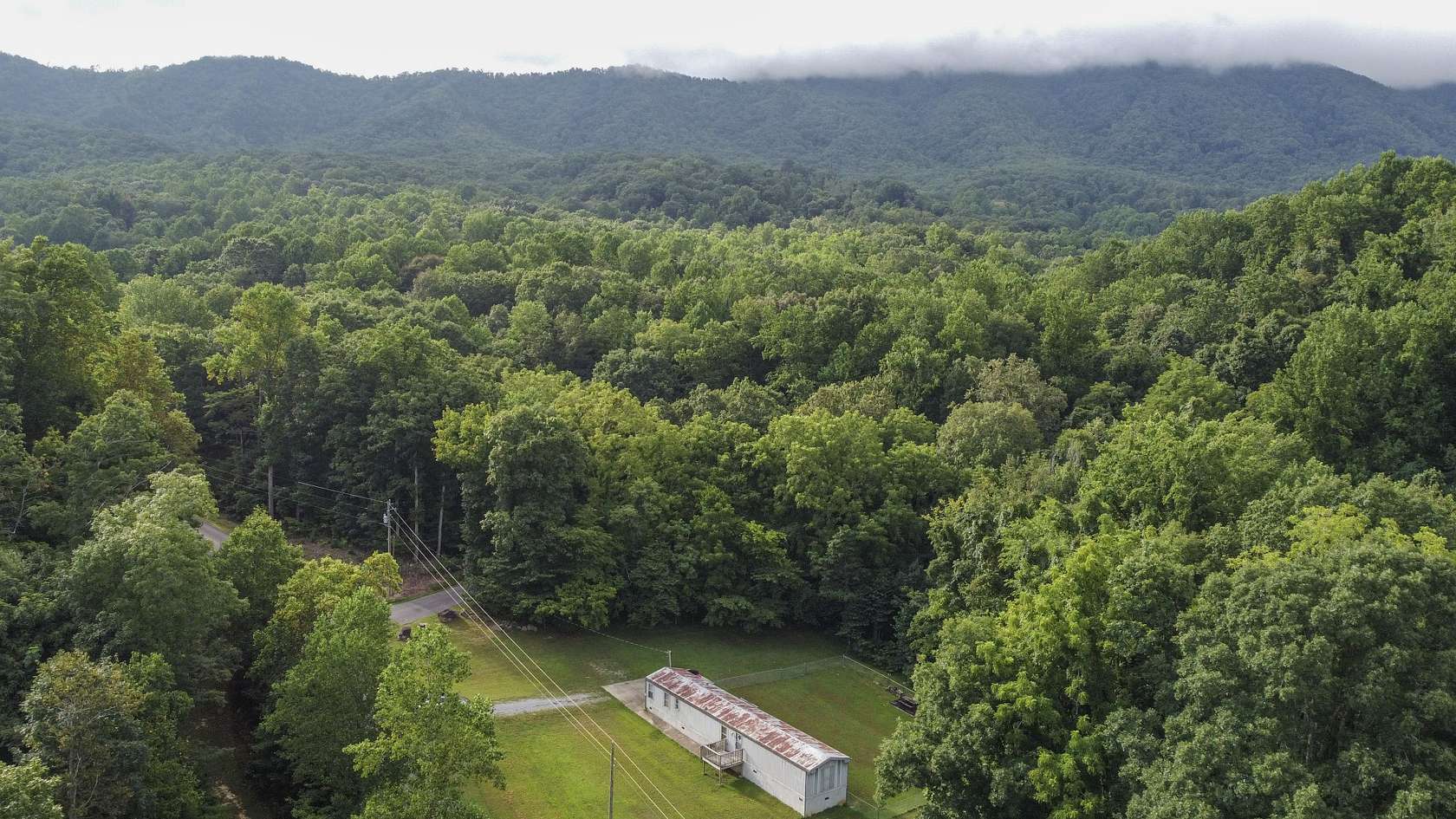6.3 Acres of Residential Land with Home for Sale in Dandridge, Tennessee