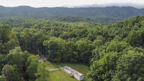 6.3 Acres of Residential Land with Home for Sale in Dandridge, Tennessee