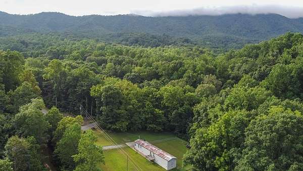 6.3 Acres of Residential Land with Home for Sale in Dandridge, Tennessee