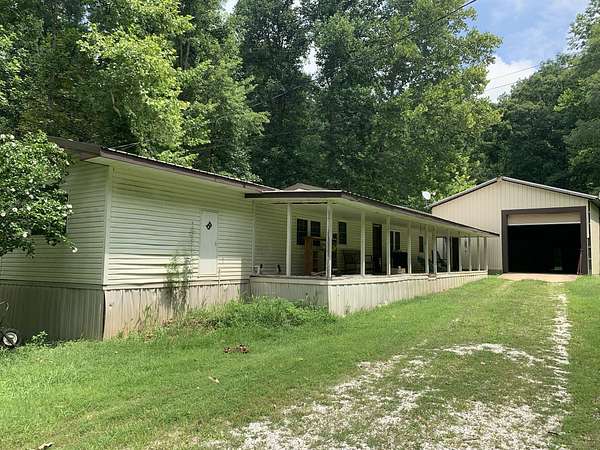 16.2 Acres of Land with Home for Sale in Rush, Kentucky