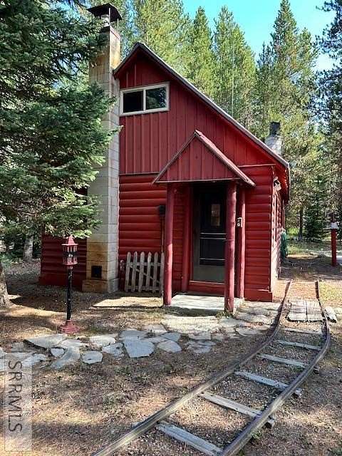 0.68 Acres of Residential Land with Home for Sale in Island Park, Idaho