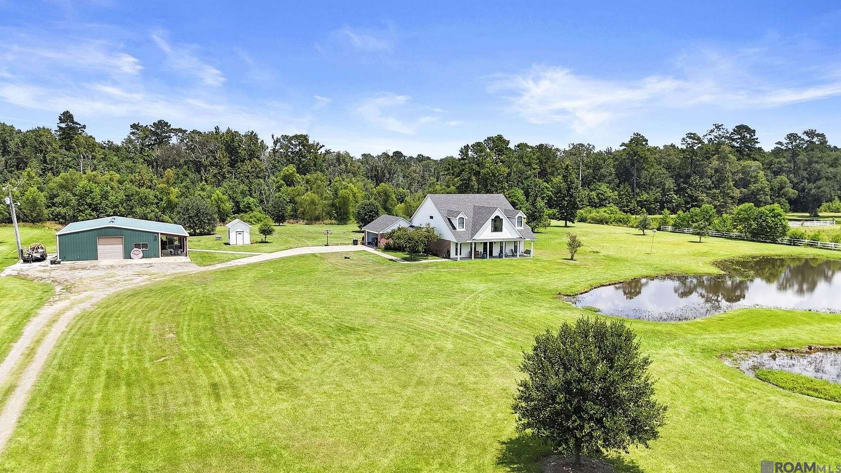 5.7 Acres of Residential Land with Home for Sale in Greenwell Springs, Louisiana