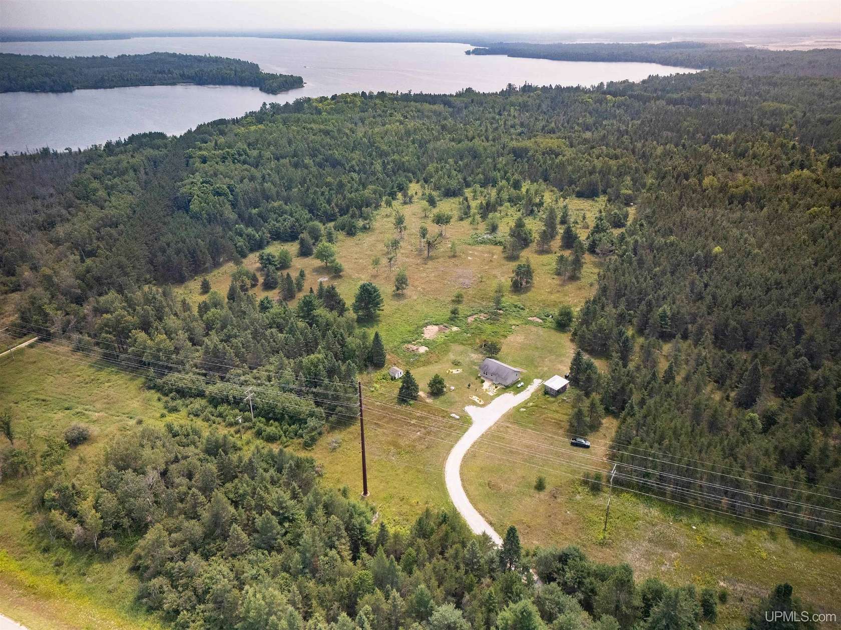 17 Acres of Land with Home for Sale in Gould City, Michigan
