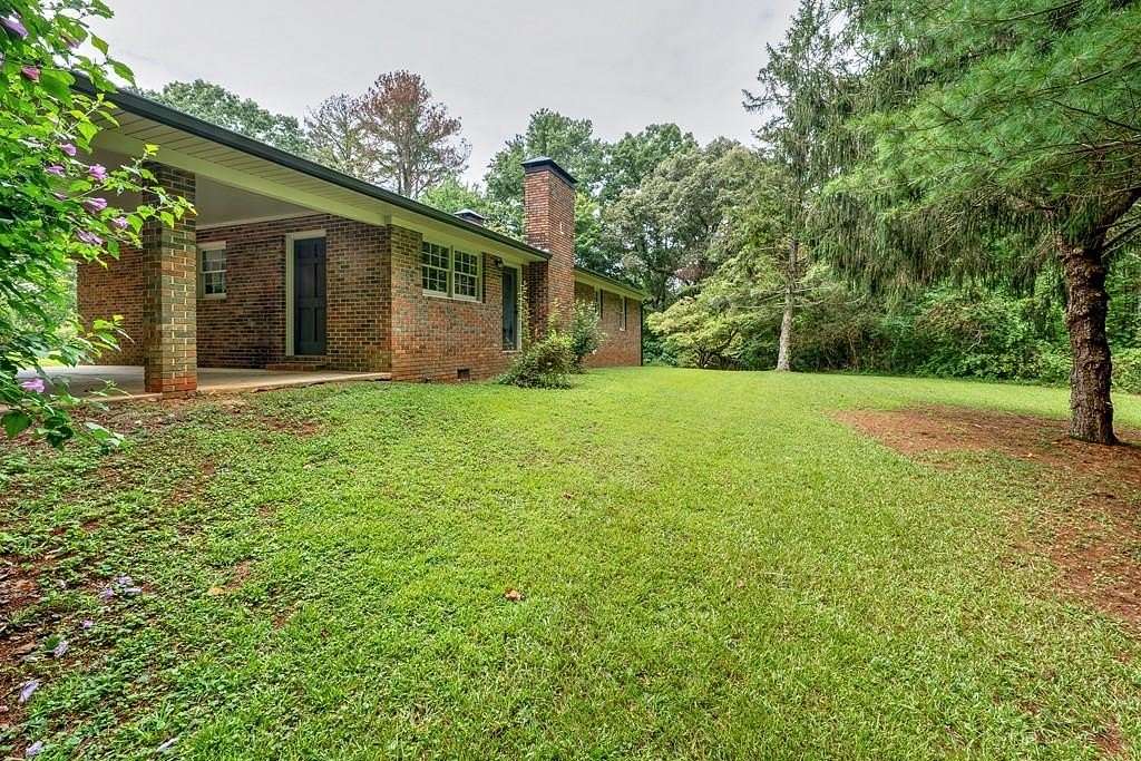 1.5 Acres of Land with Home for Sale in Ellijay, Georgia