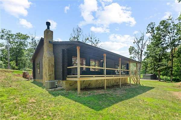 26 Acres of Recreational Land with Home for Sale in Pineville, Missouri