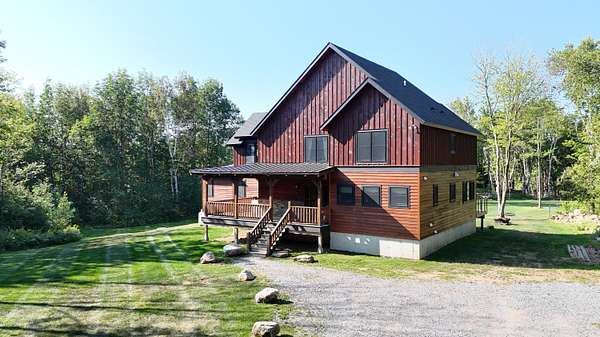 25.5 Acres of Land with Home for Sale in Morrisonville, New York