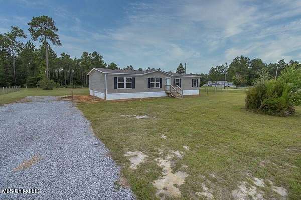 1.55 Acres of Residential Land with Home for Sale in Vancleave, Mississippi