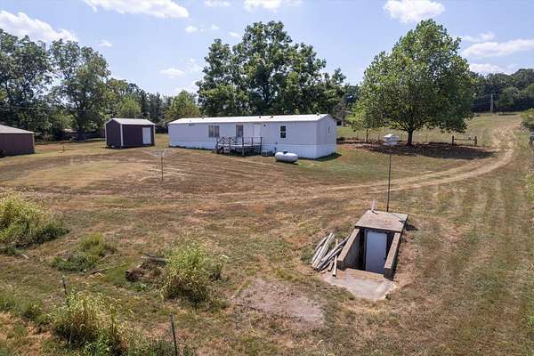 13.1 Acres of Land with Home for Sale in West Plains, Missouri