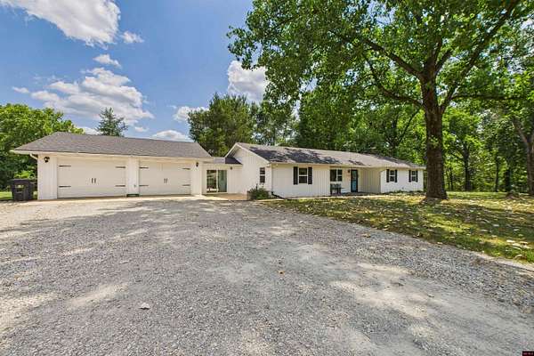 6.8 Acres of Residential Land with Home for Sale in Yellville, Arkansas