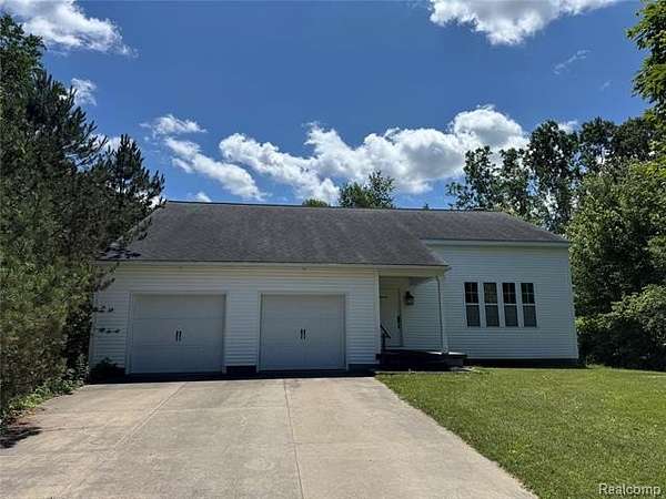 3.65 Acres of Residential Land with Home for Sale in Swartz Creek, Michigan