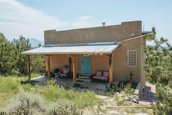 2 Acres of Residential Land with Home for Sale in Arroyo Hondo, New Mexico