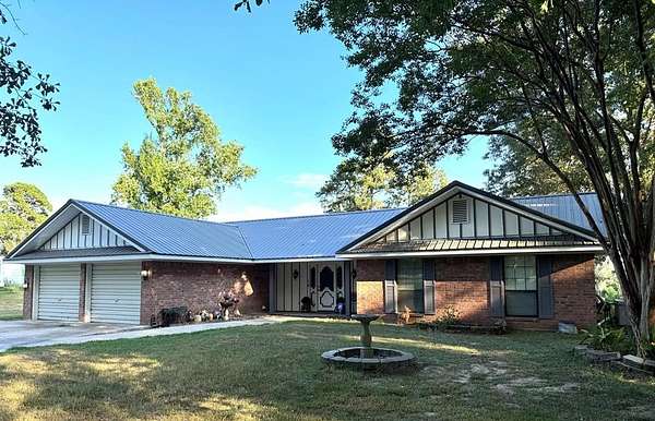 20.7 Acres of Land with Home for Sale in Shelbyville, Texas