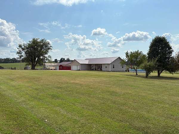 10 Acres of Land with Home for Sale in Falcon, Missouri