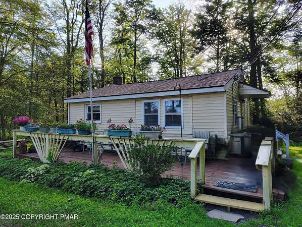 0.69 Acres of Residential Land with Home for Sale in Tobyhanna, Pennsylvania