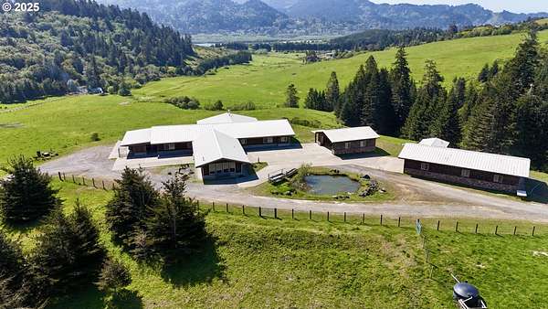 80.7 Acres of Agricultural Land with Home for Sale in Gold Beach, Oregon