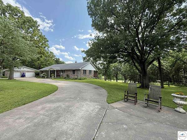 11.1 Acres of Land with Home for Sale in Otterville, Missouri