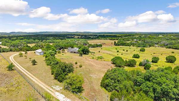 10.9 Acres of Land with Home for Sale in Blanco, Texas