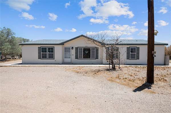 2.12 Acres of Residential Land with Home for Sale in White Hills, Arizona