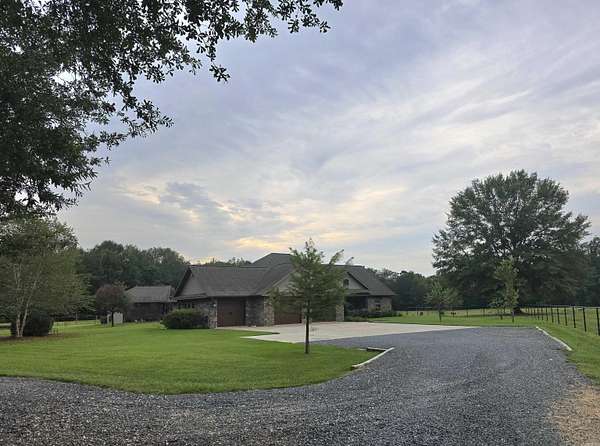 34.8 Acres of Land with Home for Sale in De Queen, Arkansas