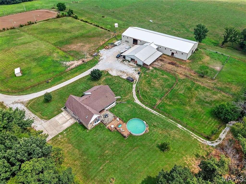 24.8 Acres of Agricultural Land with Home for Sale in Wright City, Missouri