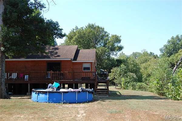 5.77 Acres of Residential Land with Home for Sale in Qulin, Missouri