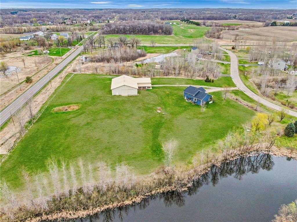 4.84 Acres of Residential Land with Home for Sale in Nowthen, Minnesota