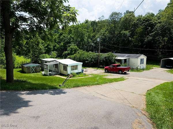 5.28 Acres of Residential Land with Home for Sale in St. Clairsville, Ohio