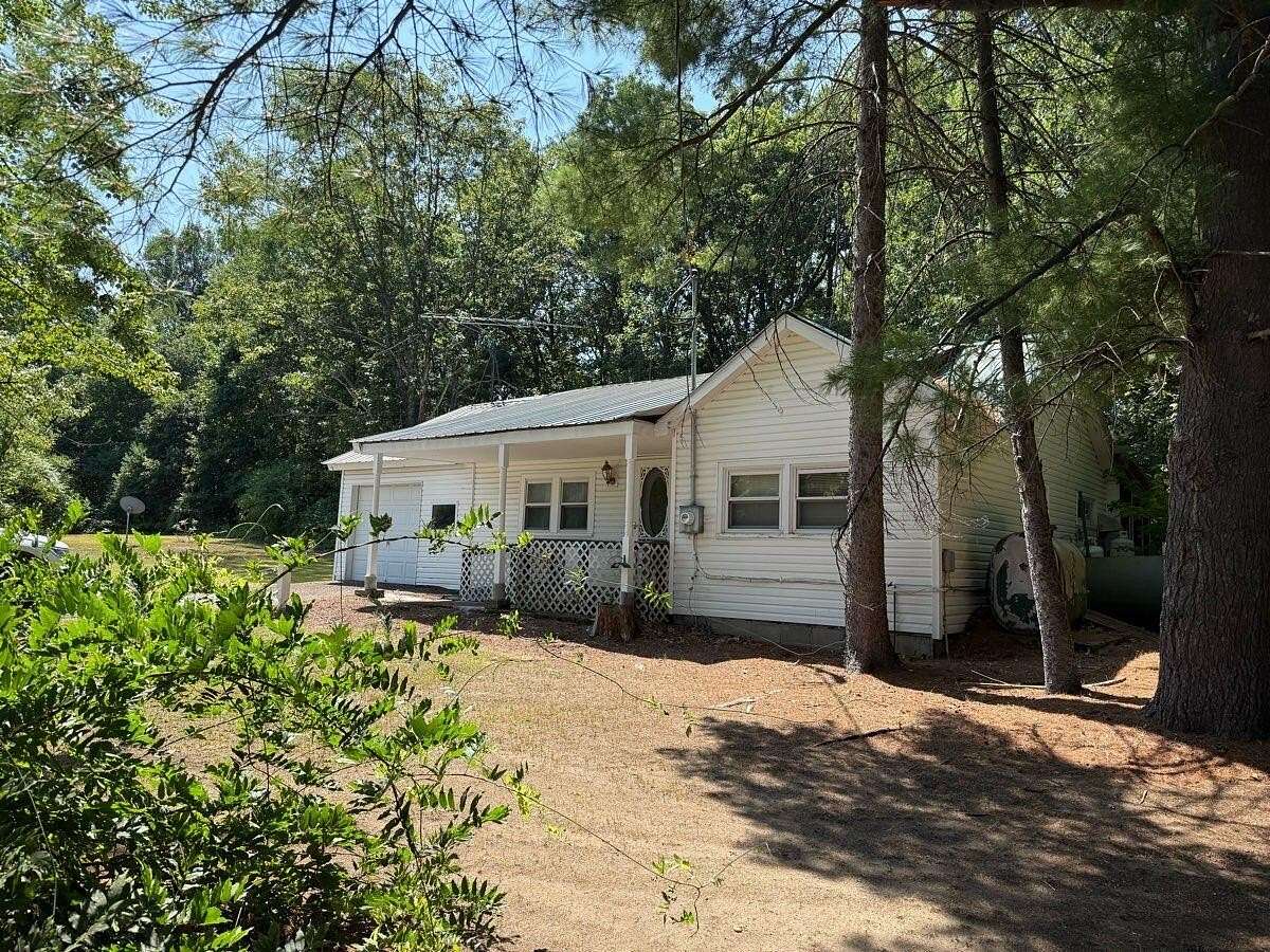 5.8 Acres of Land with Home for Sale in Peru, New York