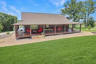 7.1 Acres of Residential Land with Home for Sale in Lampe, Missouri