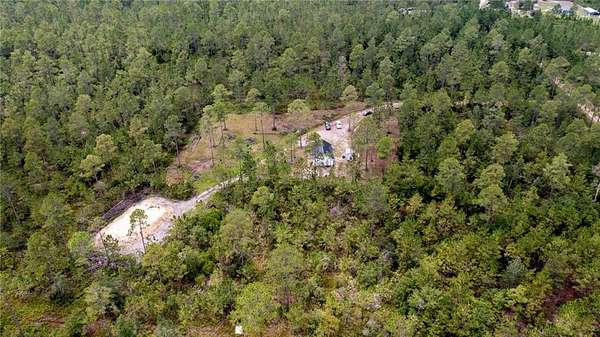 25.3 Acres of Land with Home for Sale in Folkston, Georgia