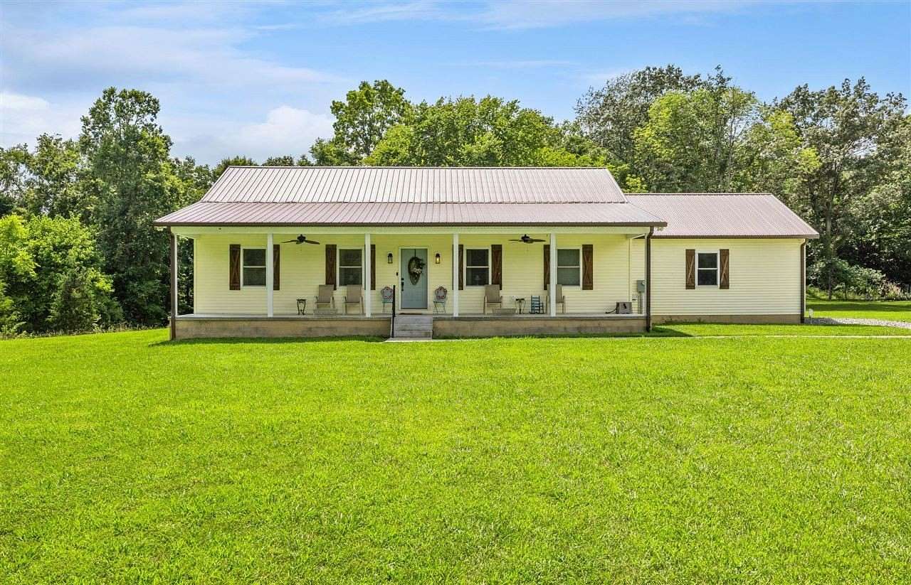 52 Acres of Land with Home for Sale in Adolphus, Kentucky