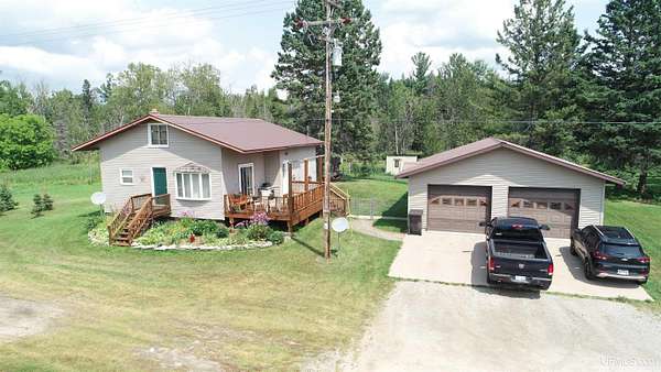 5 Acres of Residential Land with Home for Sale in Rock, Michigan