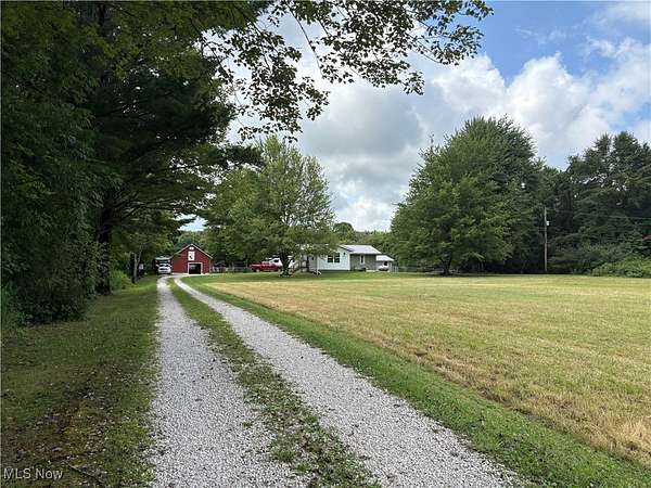 6.74 Acres of Land with Home for Sale in Kingsville, Ohio