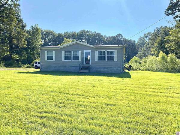 1.56 Acres of Residential Land with Home for Sale in Paducah, Kentucky