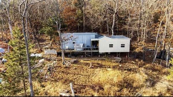 7 Acres of Land with Home for Sale in Berryville, Arkansas