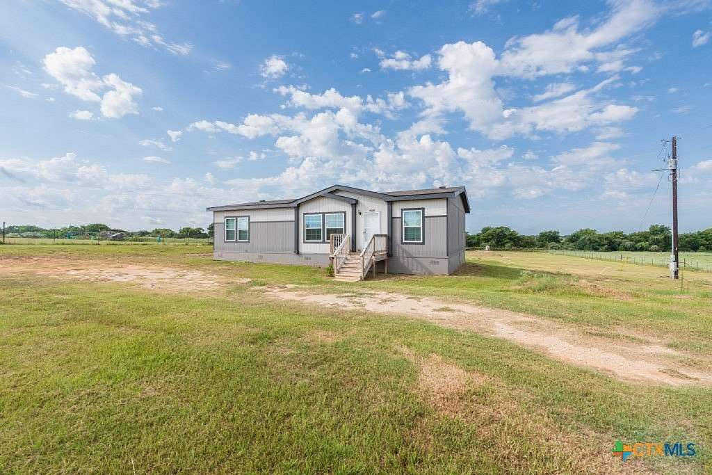 2.5 Acres of Land with Home for Sale in Luling, Texas