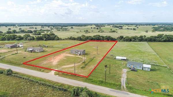 2.5 Acres of Residential Land with Home for Sale in Luling, Texas