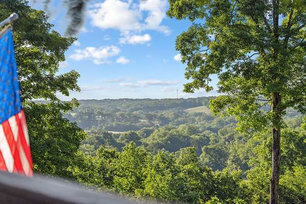 53.8 Acres of Land with Home for Auction in Nunnelly, Tennessee