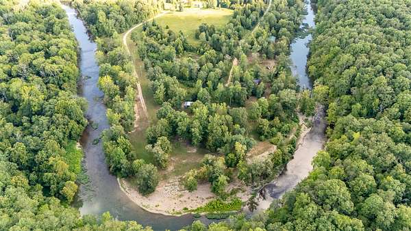 7.8 Acres of Residential Land with Home for Sale in Hohenwald, Tennessee