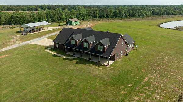 49 Acres of Recreational Land with Home for Sale in Hatchechubbee, Alabama