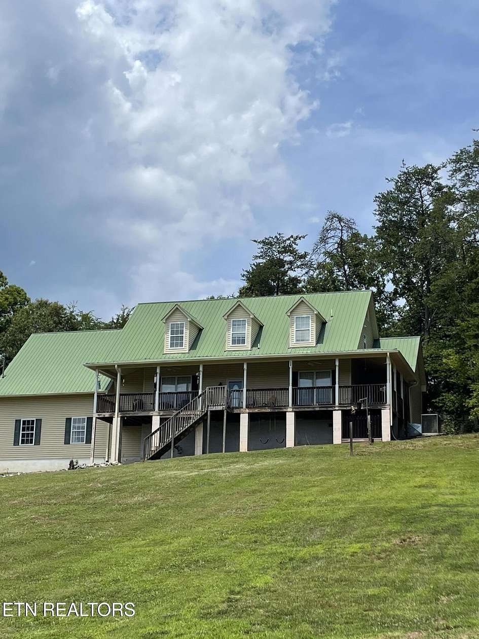 4.33 Acres of Residential Land with Home for Sale in Strawberry Plains, Tennessee