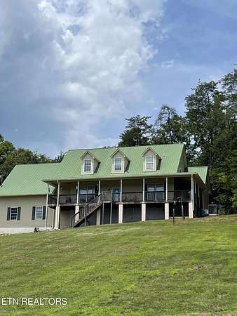 4.33 Acres of Residential Land with Home for Sale in Strawberry Plains, Tennessee