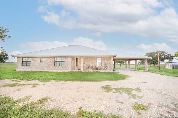 2.4 Acres of Residential Land with Home for Sale in Hondo, Texas