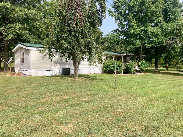 3 Acres of Residential Land with Home for Sale in Pomona, Missouri