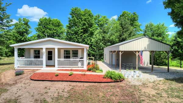 4.38 Acres of Residential Land with Home for Sale in South Boardman, Michigan