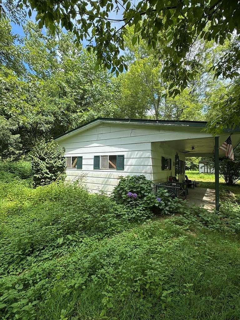 3.3 Acres of Residential Land with Home for Sale in Louisa, Kentucky