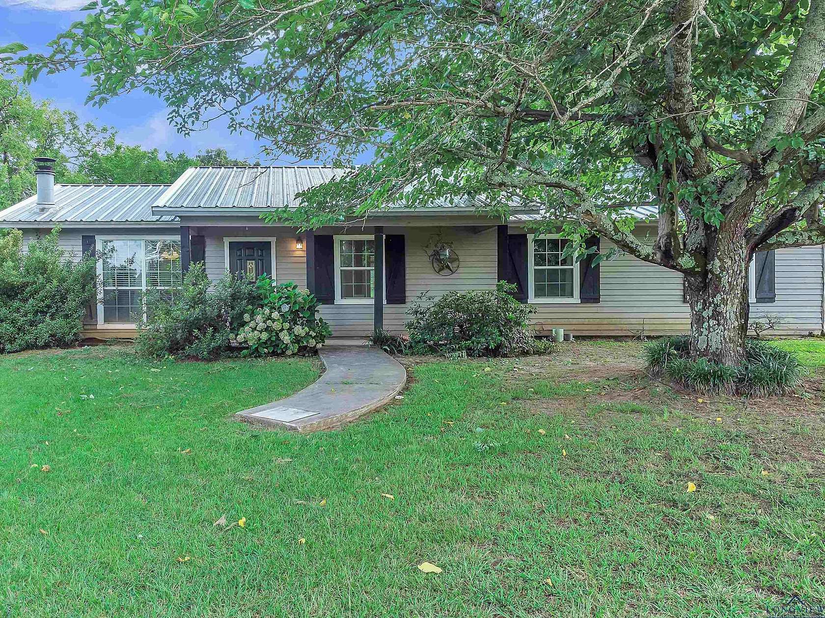 11.2 Acres of Land with Home for Sale in Hughes Springs, Texas