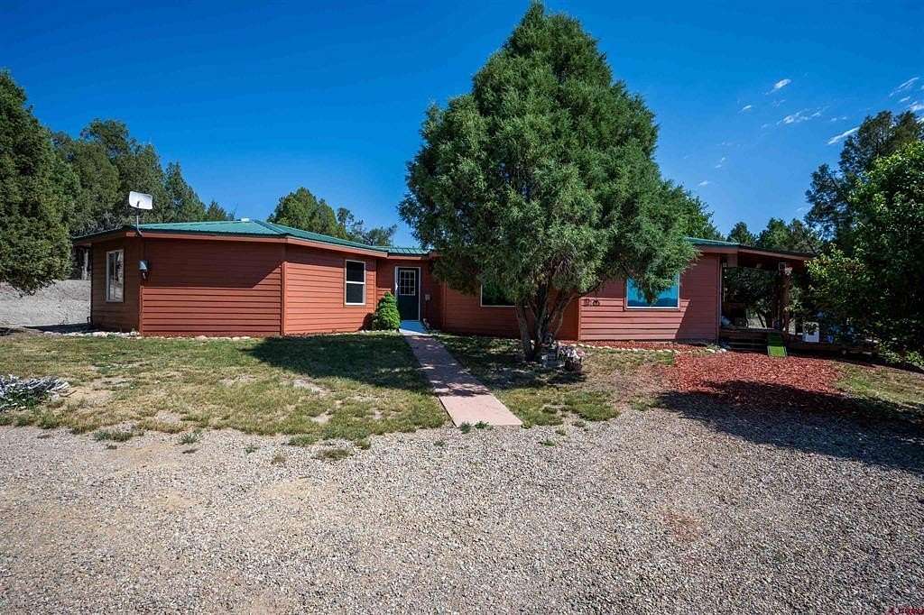 10 Acres of Land with Home for Sale in Mancos, Colorado