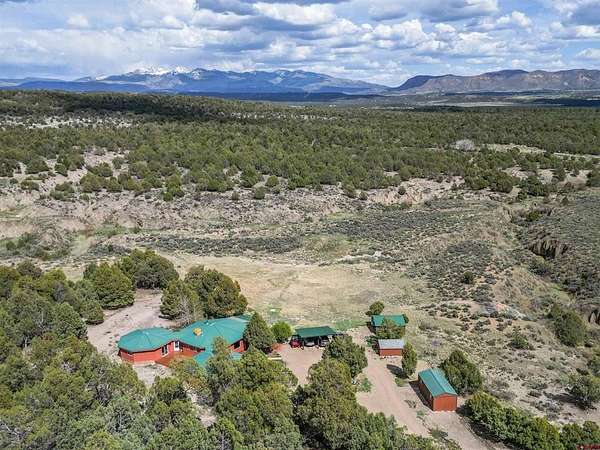 10 Acres of Land with Home for Sale in Mancos, Colorado