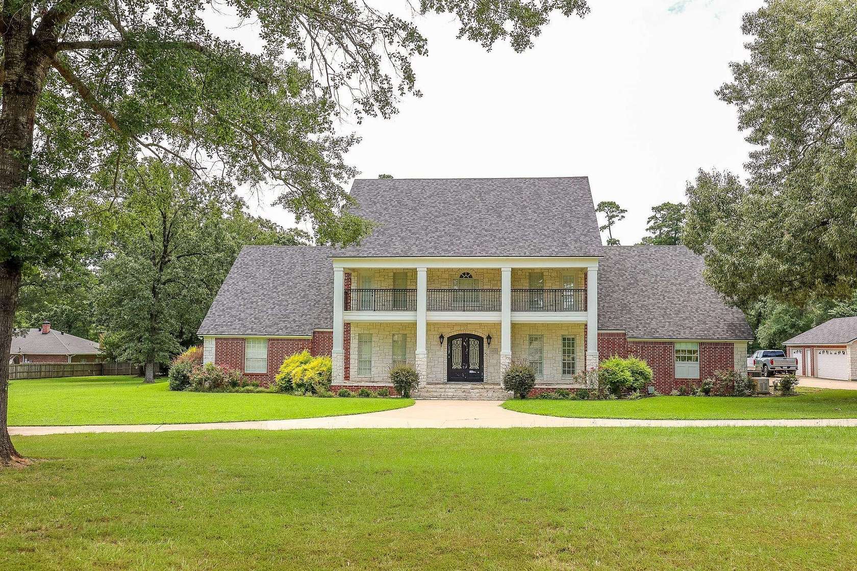 3.28 Acres of Land with Home for Sale in Carthage, Texas